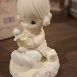 Precious Moments Pink and White Child Figurine